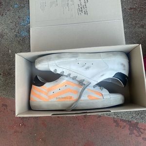 Golden Goose White Sneakers with Orange Stripes and Black Heel